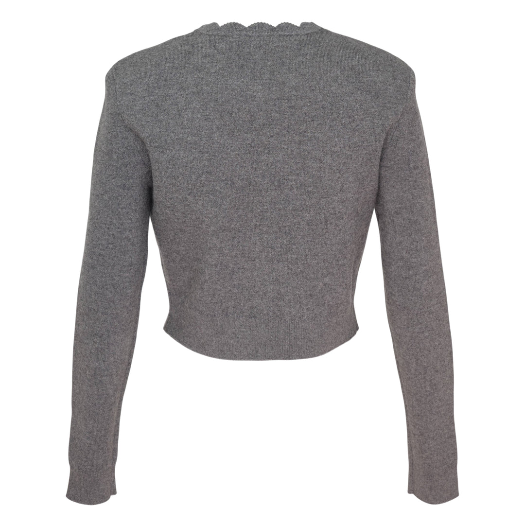 Self-Portrait grey knit cardigan with white 3D lace floral appliqués, scalloped neckline trim, and button-through front placket, laid flat on a white background