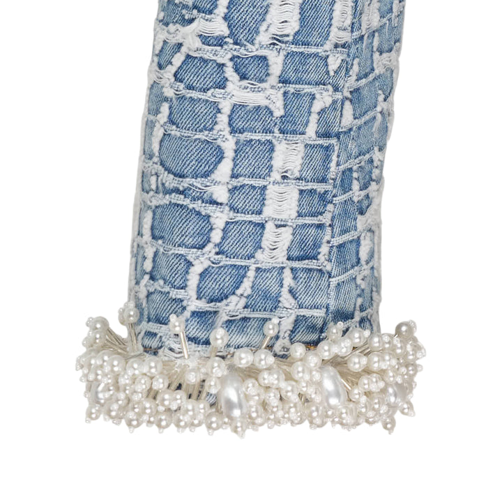 Self-Portrait Blue Textured Denim Jacket with pearl-effect neckline trim, cuff trim, and decorative pearl buttons at centre front, laid flat on a white background