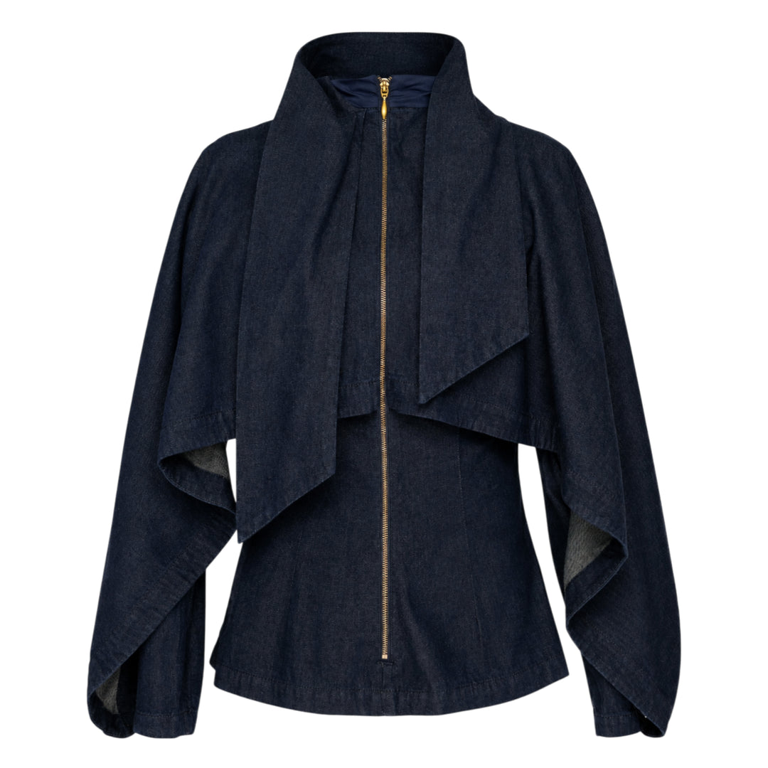 Zimmermann Draped Denim Jacket in dark indigo with cascading chest overlay, voluminous balloon sleeves, and gold-tone centre-front zip, shown on a plain white background