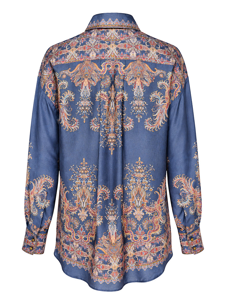 Zimmermann Valiant Relaxed Shirt in indigo blue with ornate paisley and medallion print, featuring a pussy-bow tie, navy tassel, and long buttoned sleeves - view 2