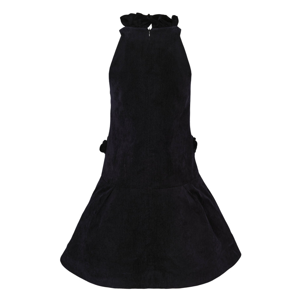 SHUSHU/TONG dark navy velvet halter mini dress with bow detail at chest, ruffled neckline and pocket trim, and drop-waist flared skirt — front view on white background