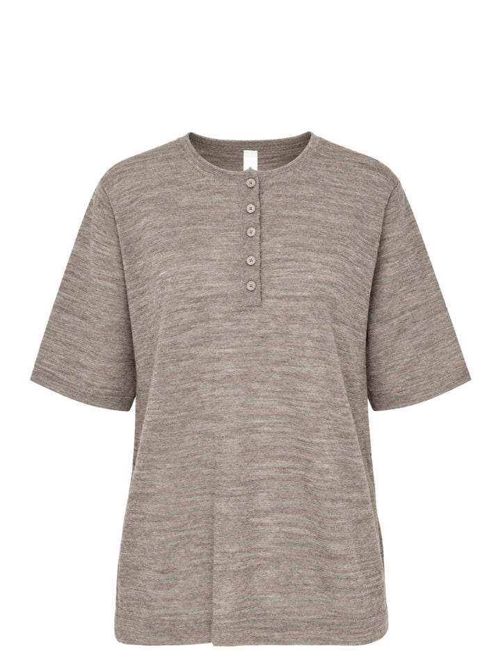 Lauren Manoogian Fine Henley knit top in heathered taupe with short sleeves, a round neck, and a partial button placket, shown flat on a white background