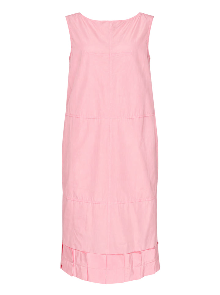Lee Mathews Nina Silk Ruffle Dress in blush pink — sleeveless midi with panelled construction and a pleated ruffle hem, shown on a white background