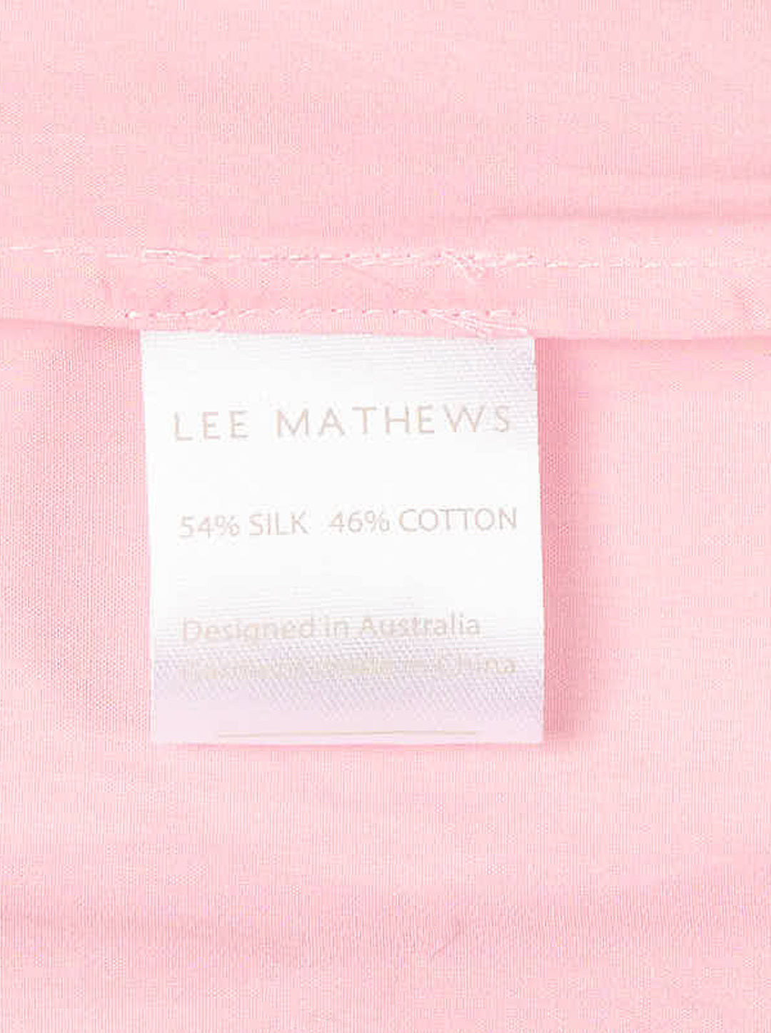 Lee Mathews Nina Long Sleeve Shirt in blush pink, featuring a cascading ruffle jabot along the button placket, point collar, mother-of-pearl buttons, and double-button cuffs - view 3