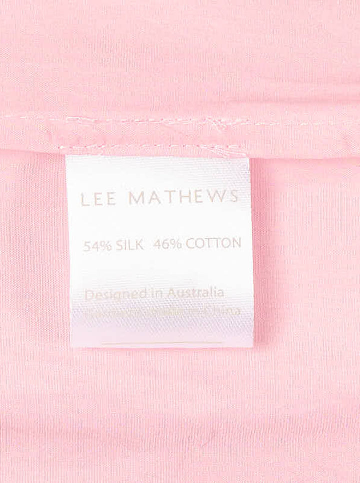 Lee Mathews Nina Long Sleeve Shirt in blush pink, featuring a cascading ruffle jabot along the button placket, point collar, mother-of-pearl buttons, and double-button cuffs - view 3