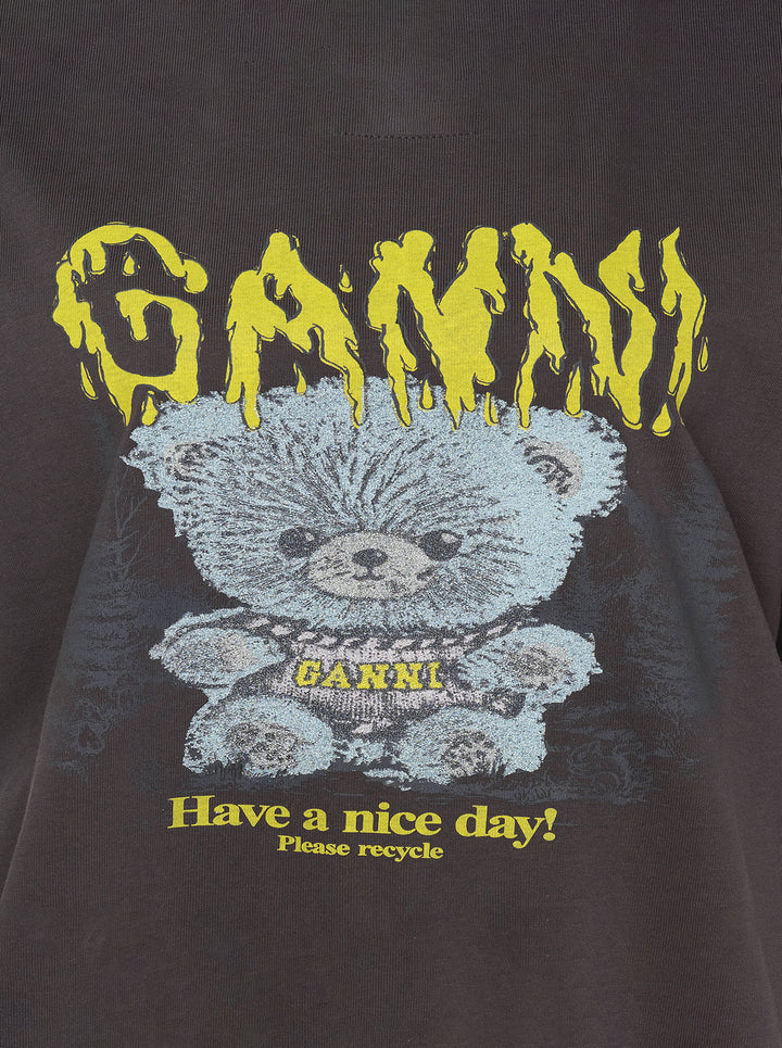Ganni Heavy Cotton Forest Ted T-shirt in washed black, featuring a yellow drip-style Ganni logo above a teddy bear mascot graphic and 'Have a nice day! Please recycle' slogan print - view 3