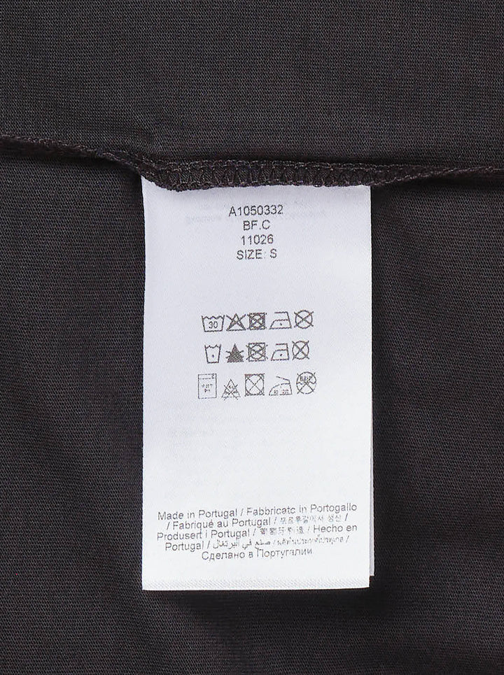Ganni washed black relaxed cotton tee with distressed collegiate 'GANNI' lettering and a twin teddy bear mushroom graphic print reading 'Have a nice day! Please recycle' - view 3