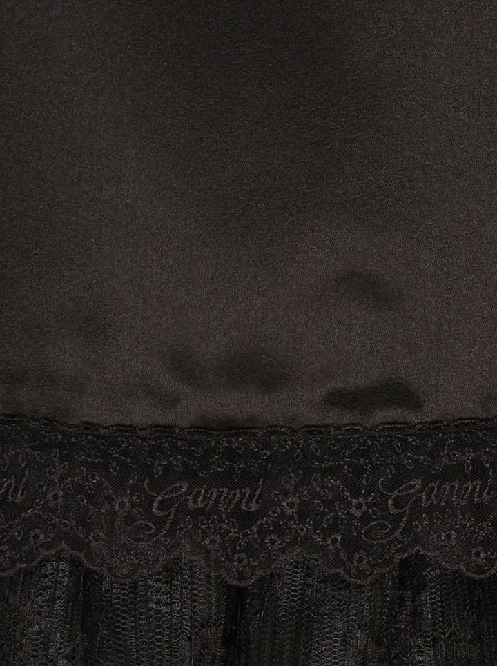 Ganni black fluid satin knee-length slip skirt with elasticated waist and tiered logo-embroidered lace frill hem - view 4