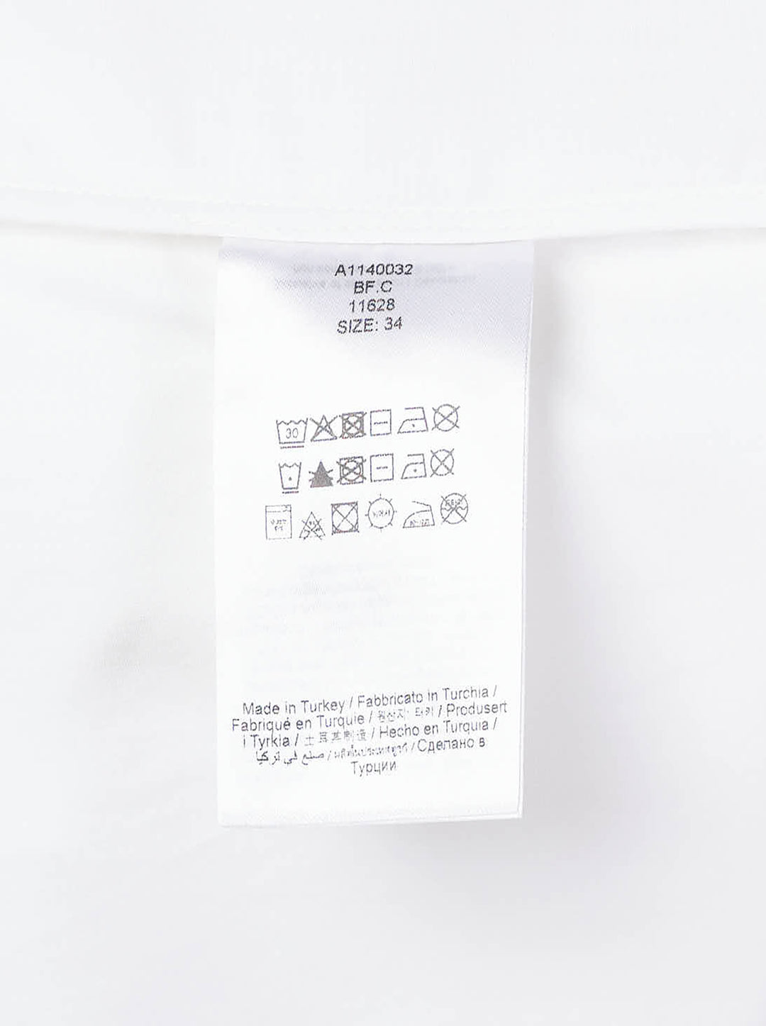 Ganni Compact Poplin Pleated Sleeve Shirt in white, featuring voluminous gathered sleeves, button-front placket with pearlescent buttons, and a patch chest pocket - view 3