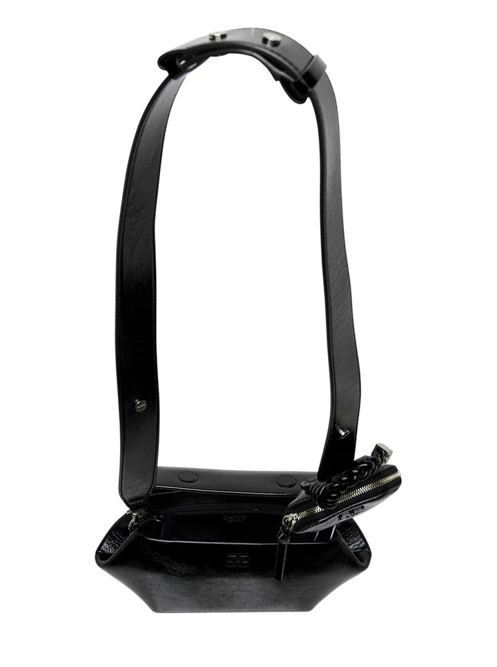 Ganni Bou East/West Box crossbody bag in glossy black with wide crossed strap, braided charm and detachable mini zip pouch - view 3