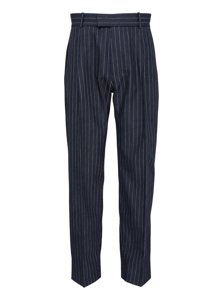Navy pinstripe single pleat trousers by Drôle de Monsieur, shown front-facing with high waist and tapered leg