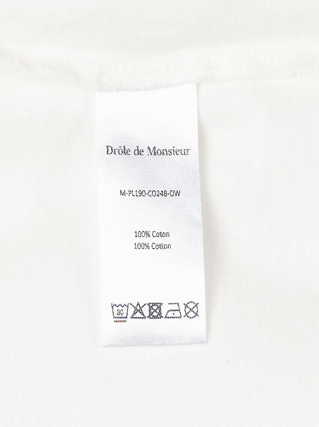 Drôle de Monsieur Slogan Long Sleeve Polo in cream with forest-green contrast collar, striped ribbed cuffs, and 'Not From Paris Madame' chest embroidery - view 4