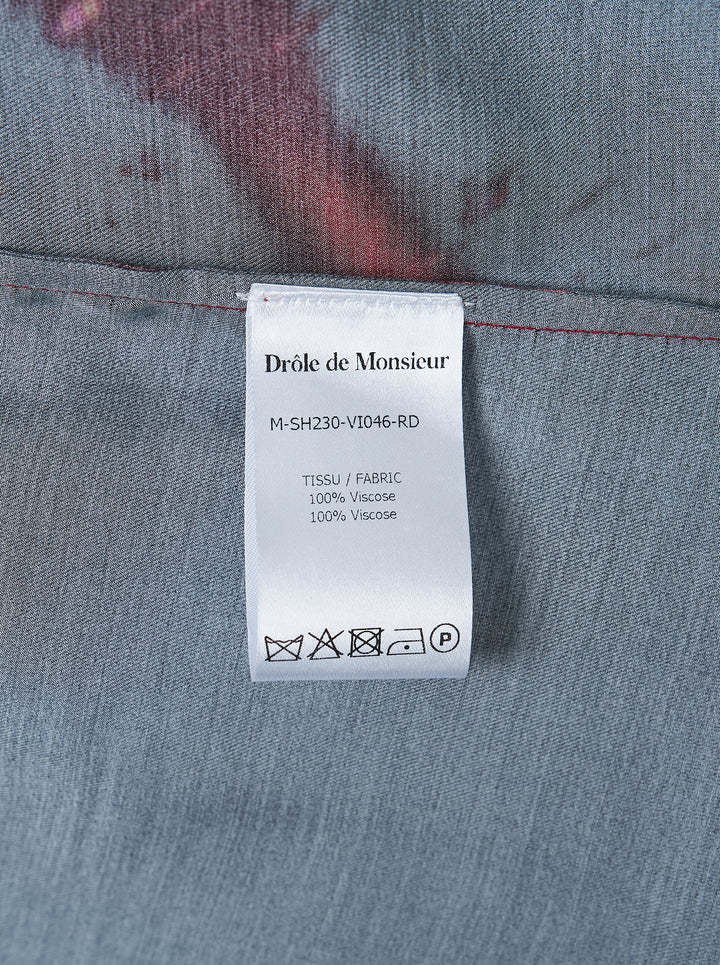 Drôle de Monsieur Notcha short sleeve shirt in a red and black abstract fire print with a camp collar and black buttons - view 3