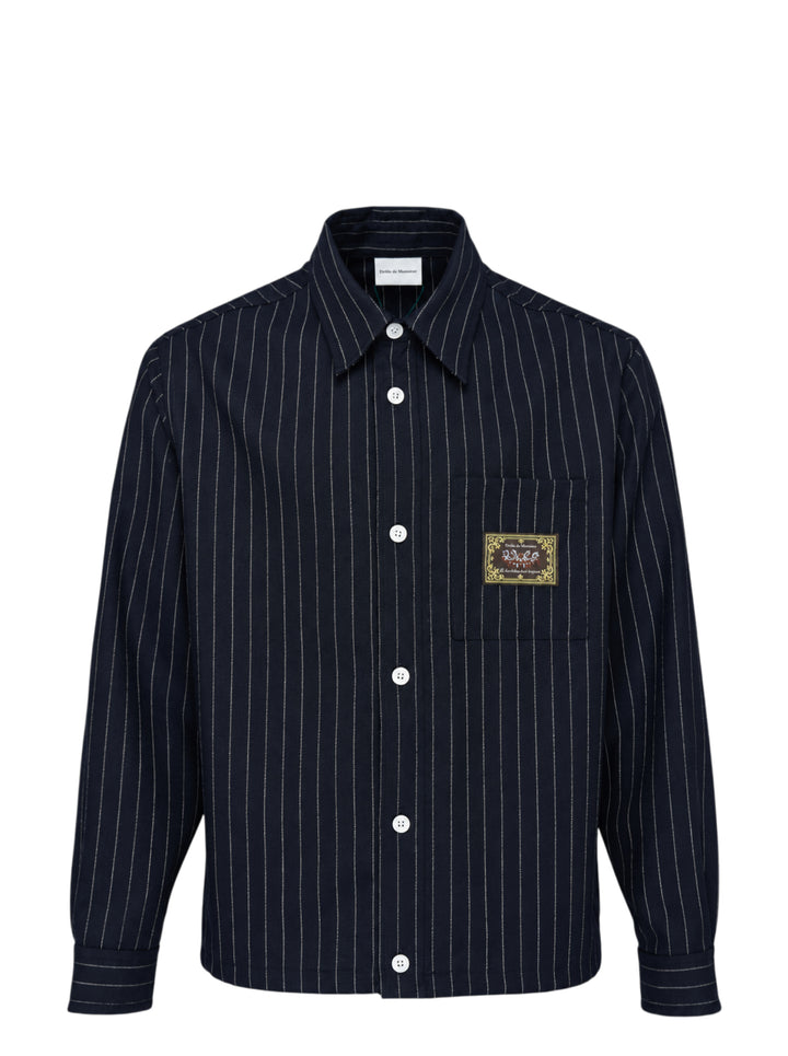 Drôle de Monsieur navy pinstripe long sleeve shirt with white buttons and a woven label on the chest pocket