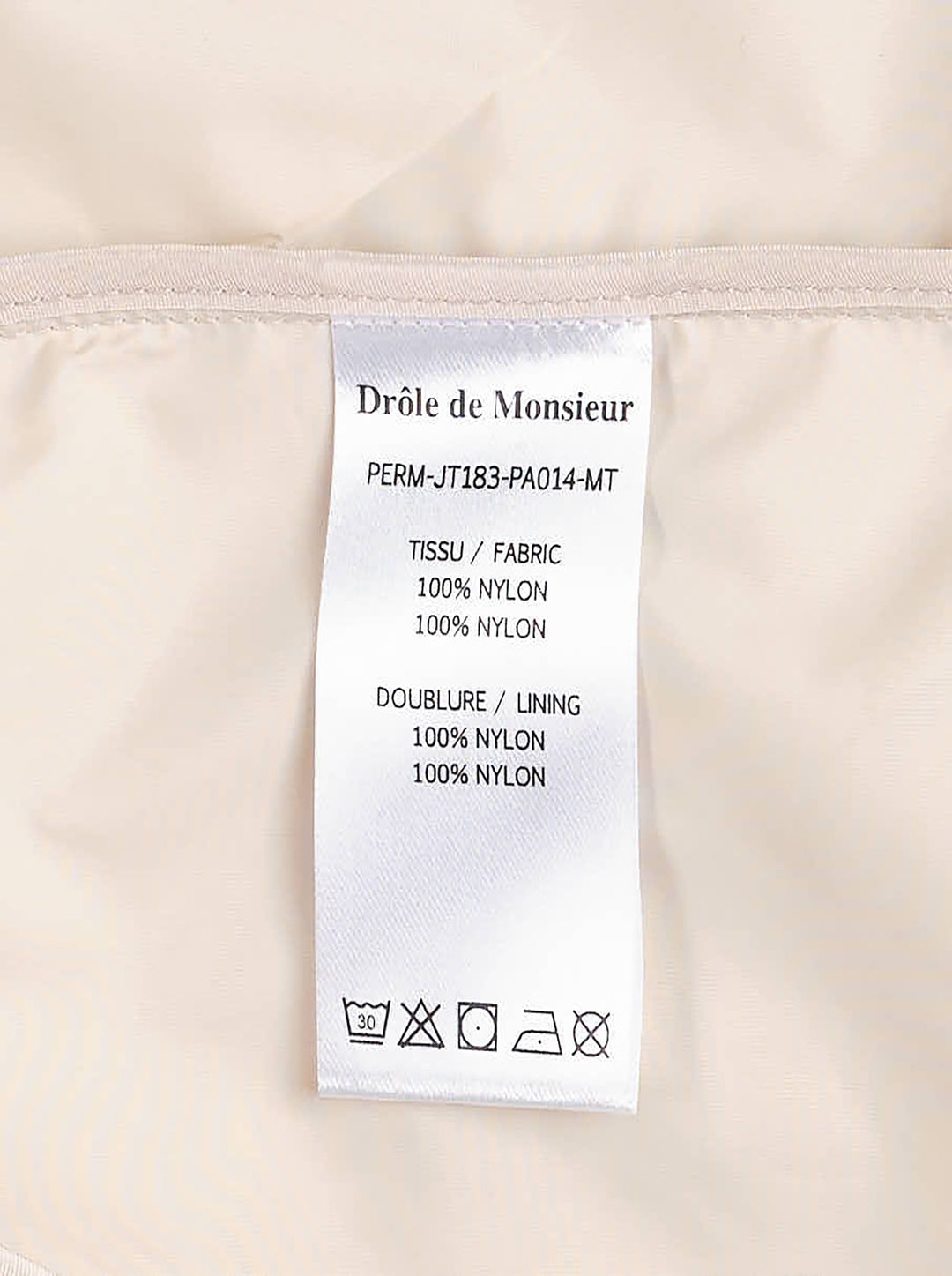 Drôle de Monsieur Not From Paris Madame slogan coach jacket in ecru with snap-button closure, point collar, elasticated cuffs, and embroidered chest slogan - view 5