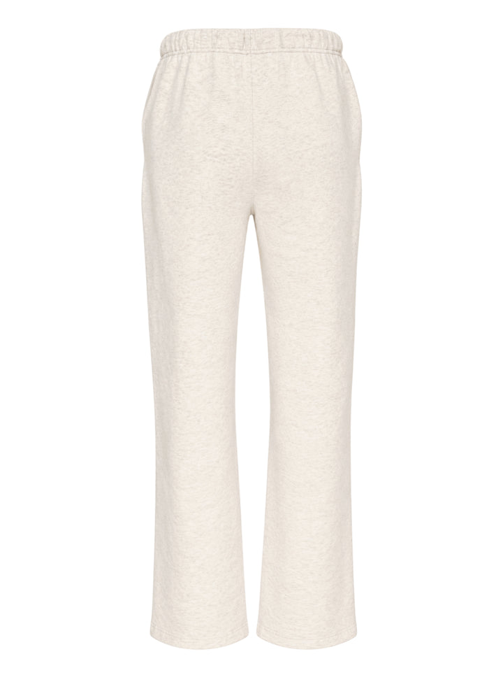 Fear of God ESSENTIALS women's slim sweatpants in heathered oat with drawcord waist, black logo tab and navy embroidered script logo - view 2