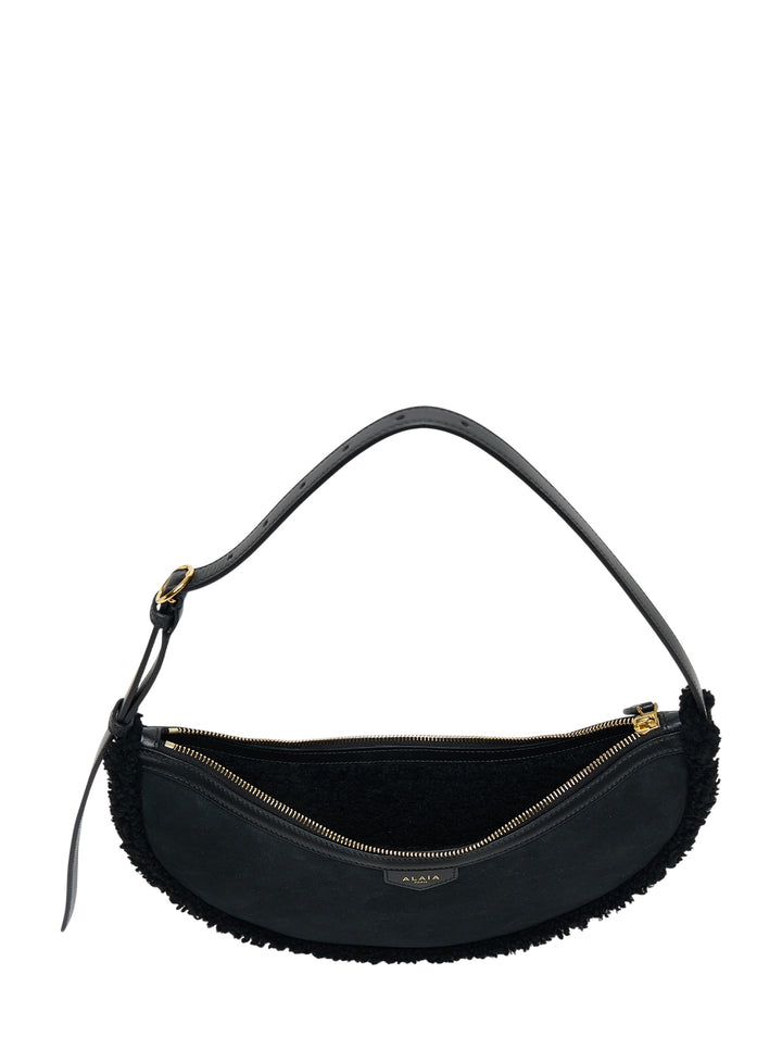 Alaïa Demi Lune black suede crescent shoulder bag with merino shearling trim and slim adjustable leather strap - view 3
