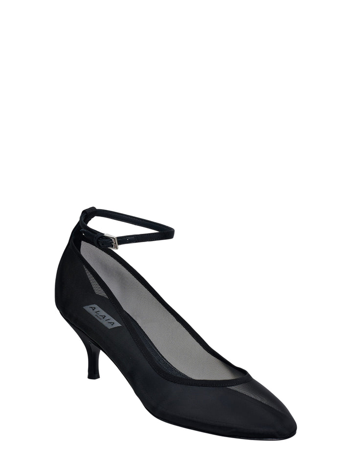Alaïa black tulle and grosgrain kitten heel pump with adjustable ankle strap, pointed toe, and approx. 60mm heel, shown in profile on white background - view 2