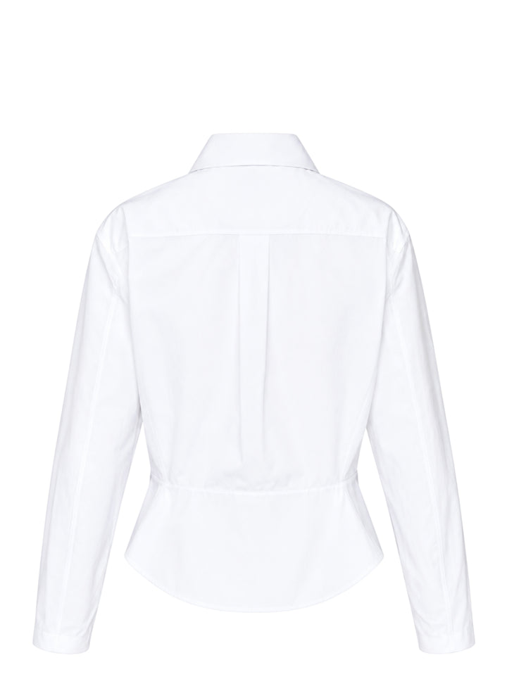 Alaïa Basque Cotton Poplin Shirt in white, featuring a sculpted waist seam, peplum hem, point collar, and mother-of-pearl button front fastening - view 2