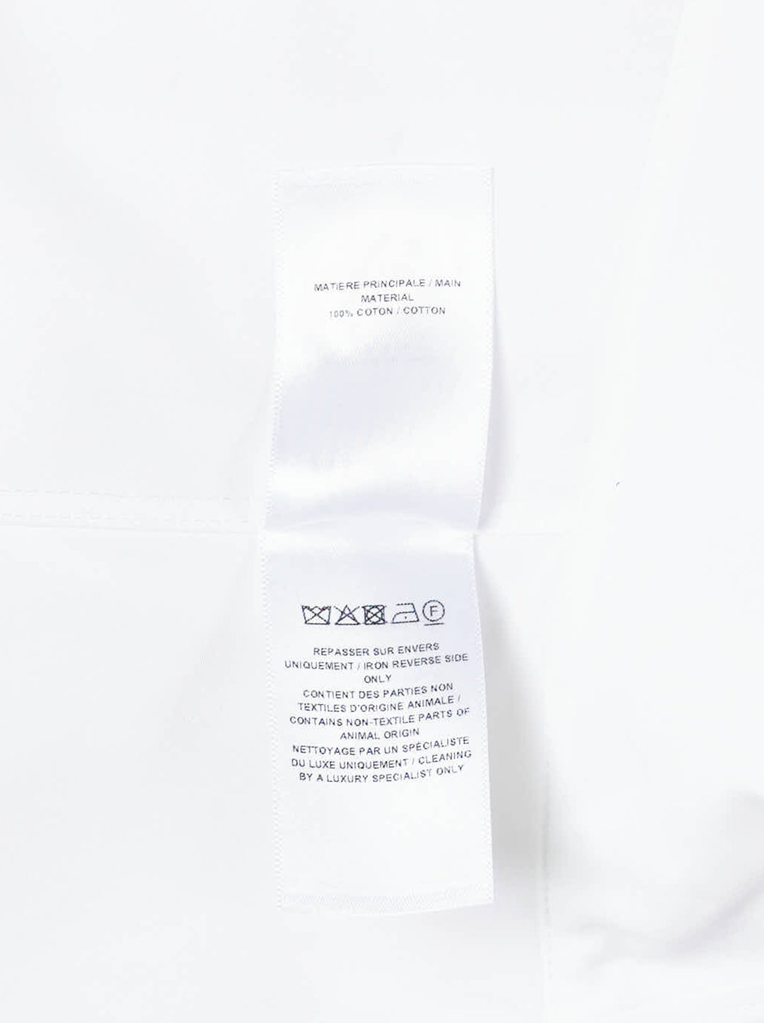 Alaïa Basque Cotton Poplin Shirt in white, featuring a sculpted waist seam, peplum hem, point collar, and mother-of-pearl button front fastening - view 3