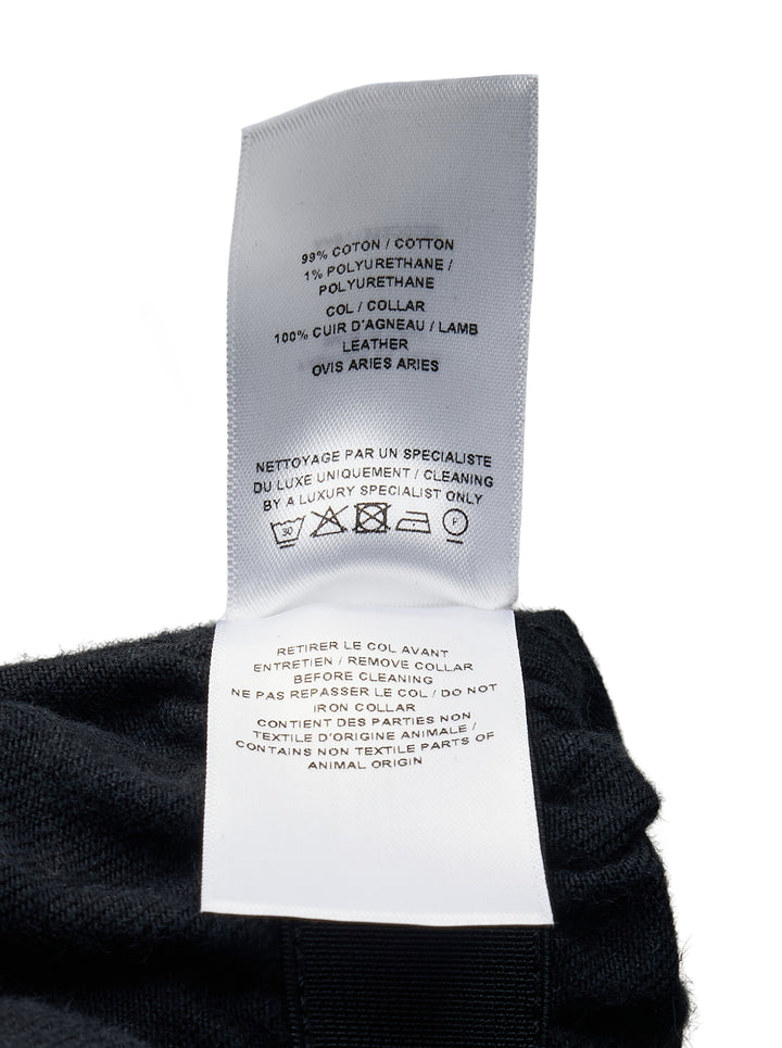 Alaïa Black Denim Trucker Jacket with curly black shearling collar, button-through front closure, twin chest flap pockets, and cropped silhouette on white background - view 3