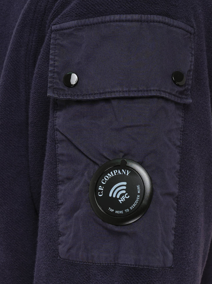 Navy brushed crew neck sweatshirt by C.P. Company with a sleeve utility pocket and signature lens detail - view 4