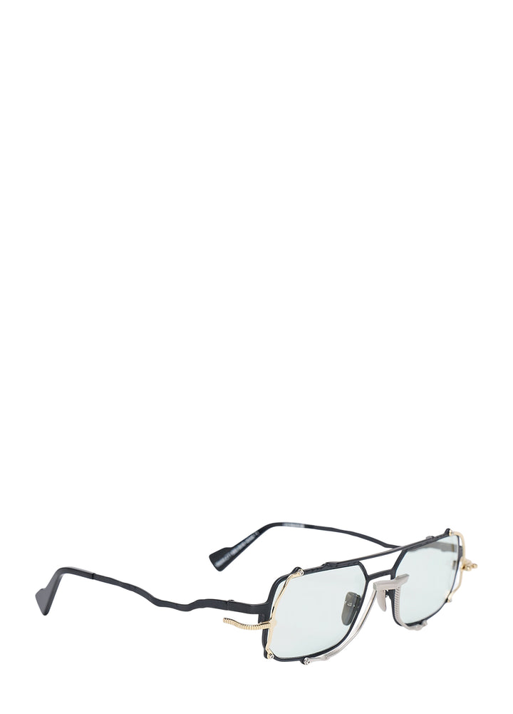 Kuboraum Black Gold Pilotis Frame glasses with angular matte black, gold and silver metal frame, double bridge and pale tinted lenses, front view - view 2