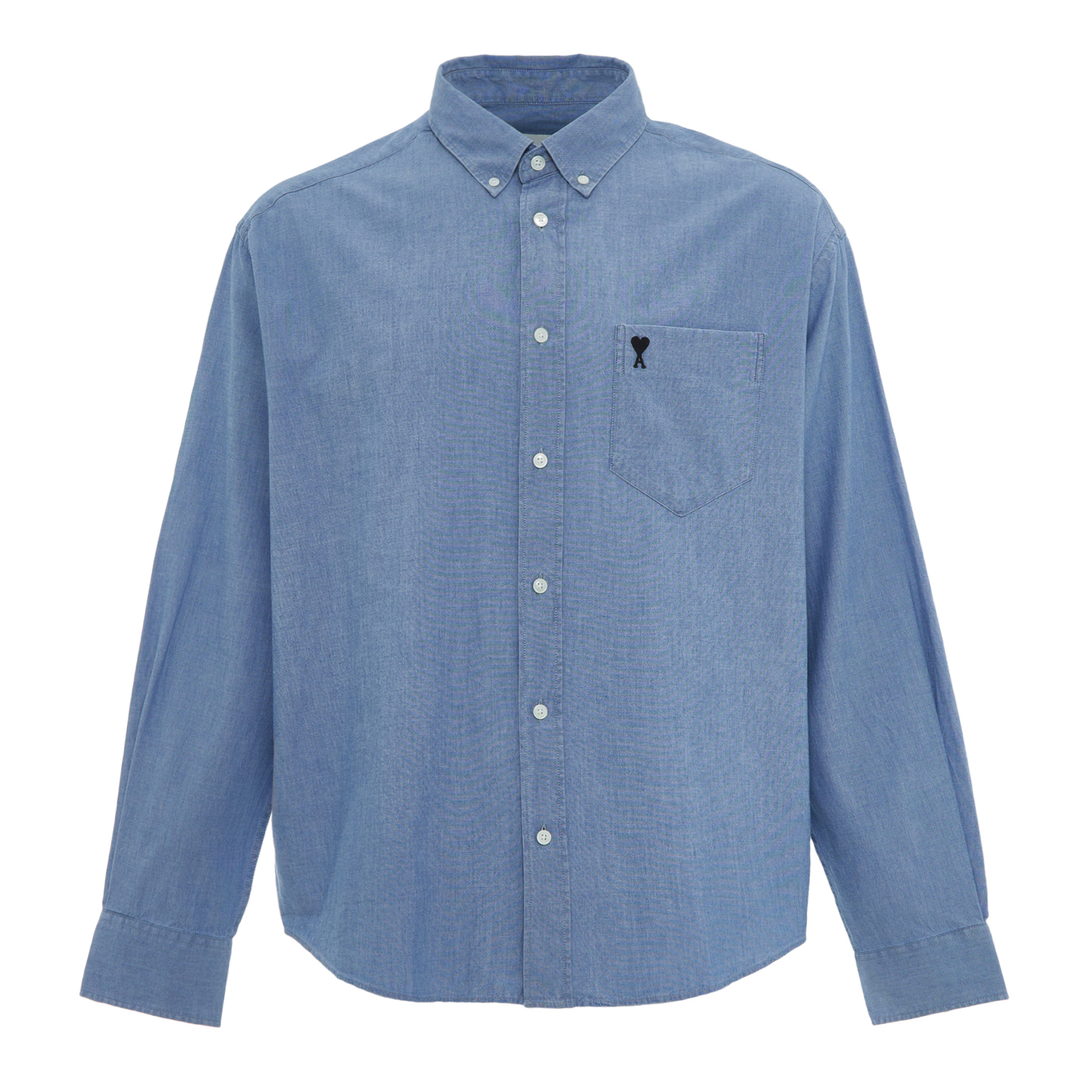 AMI Embroidered ADC Long Sleeve Shirt in washed chambray blue with button-down collar and black Ami de Cœur logo on chest pocket