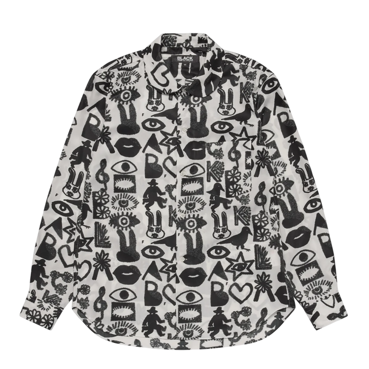 Comme des Garçons BLACK Filip Pagowski all-over print long sleeve shirt in black and white with graphic motifs of eyes, lips, stars, and birds laid flat on white background