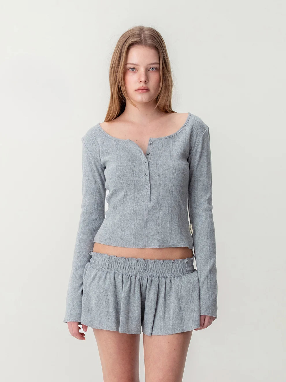 Glowny Honey Eyelet Button Long Sleeve Top in heather grey ribbed knit with tonal button placket and scoop neckline