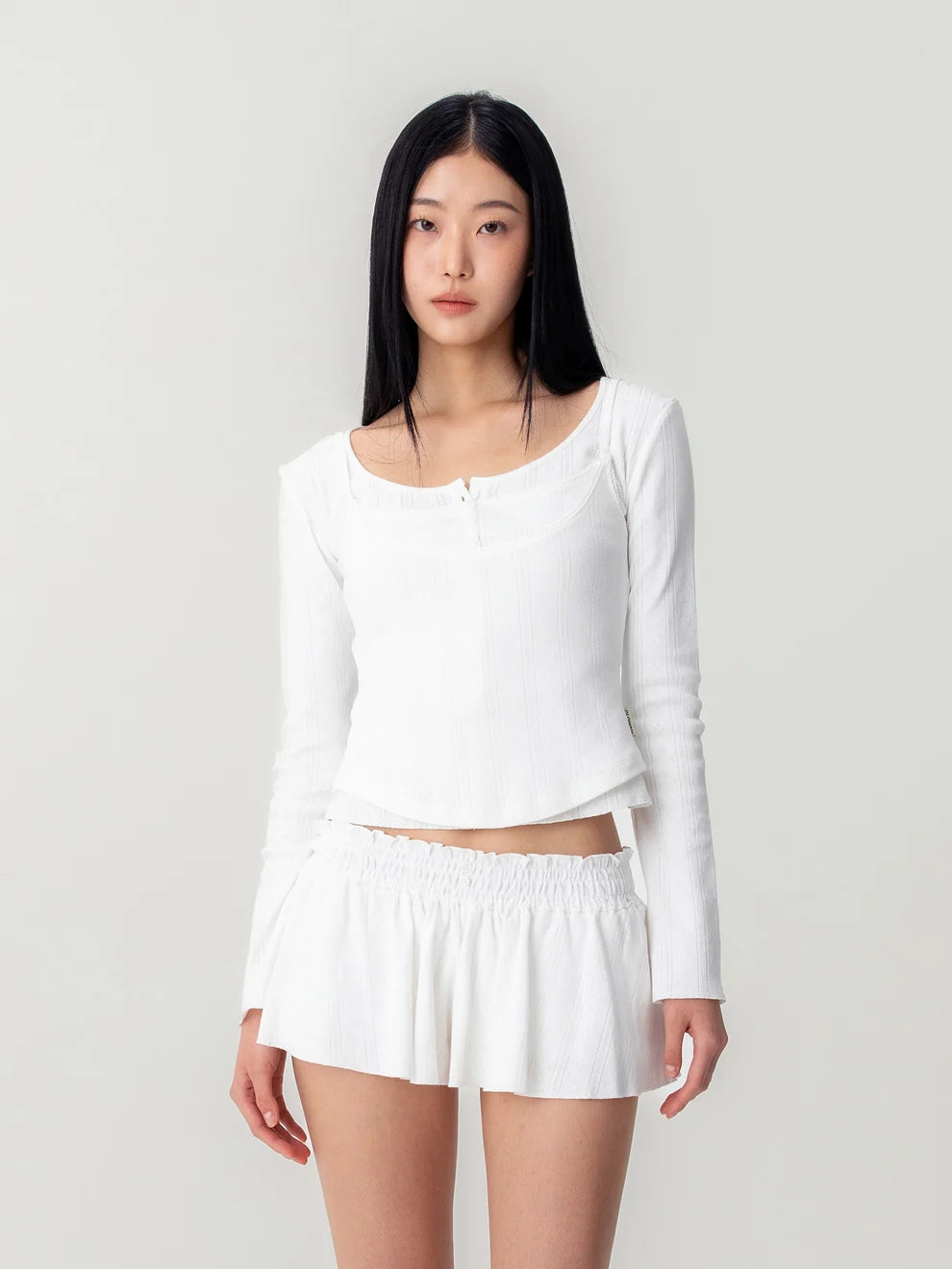 Glowny Honey Eyelet Button Long Sleeve Top in heather grey ribbed knit with tonal button placket and scoop neckline