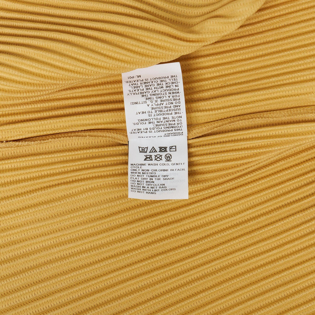 Club21 - HOMME PLISSE ISSEY MIYAKE - Monthly Colors: August Polo Shirt - PLEATED POLO - Denrite Beige