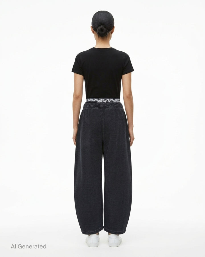 Alexander Wang washed black brushed denim sweatpants with layered logo elastic waistband and curved barrel leg - back