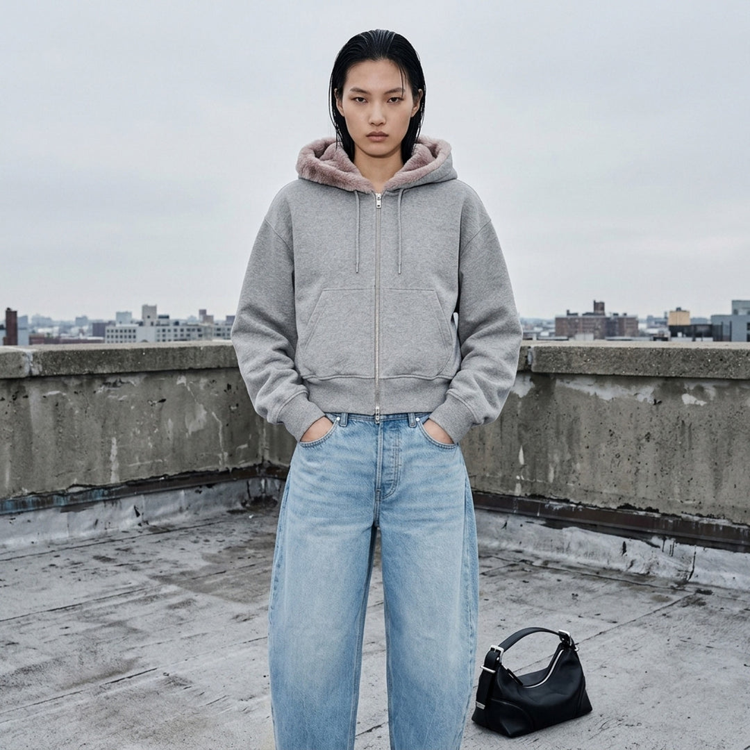 Alexander Wang cropped heather grey zip-up hoodie with faux fur-lined hood, front view - lifestyle