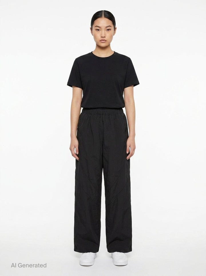 Mid-Rise Perforated Track Pants | Alexander Wang | Club21 - front