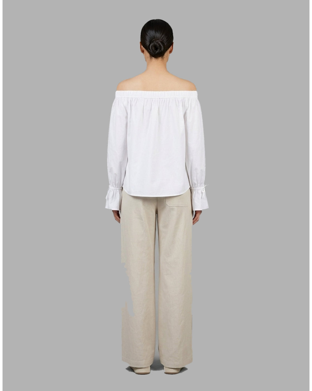 Club21 Collection Adele wide-leg pants in light neutral nylon cotton twill with patch pockets and double button waistband, front view - back