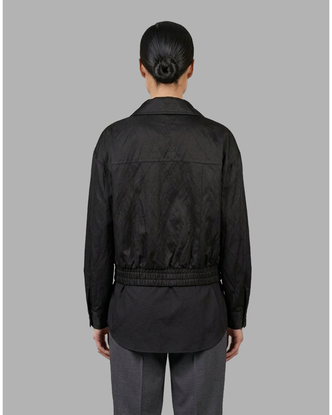Cream cropped bomber jacket with stand collar, flap chest pockets, metal snap buttons and elasticated hem by Club21 Collection - back