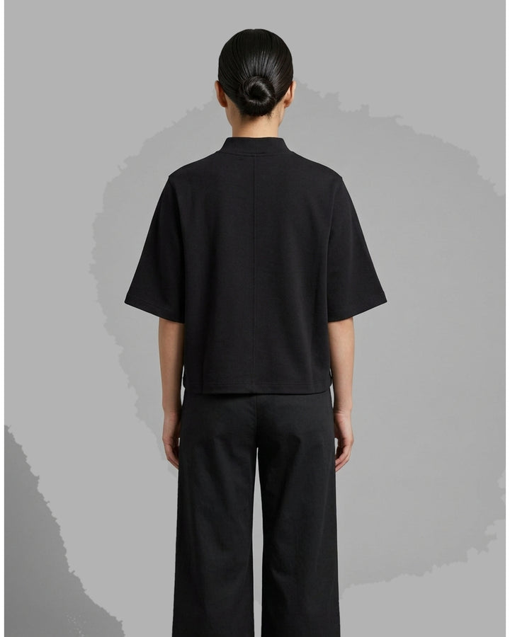 Red cropped cotton spandex jersey tee with mock neckline and elbow-length sleeves, shown front view - back