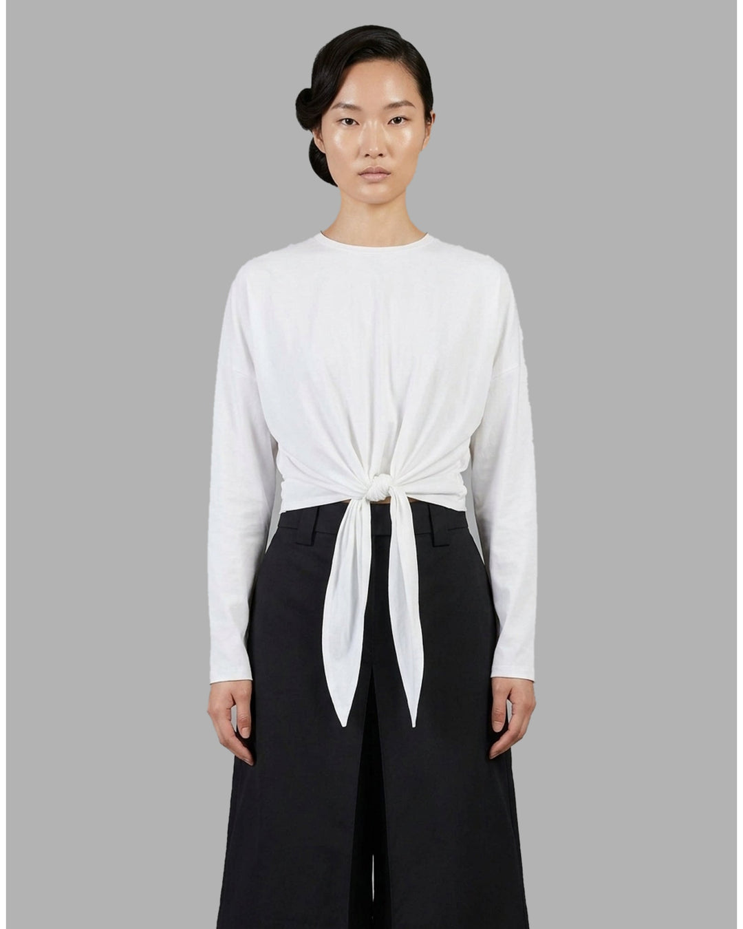 Club21 Collection Leni white long-sleeve cotton jersey top with drop shoulders and a knotted tie at the front hem - front