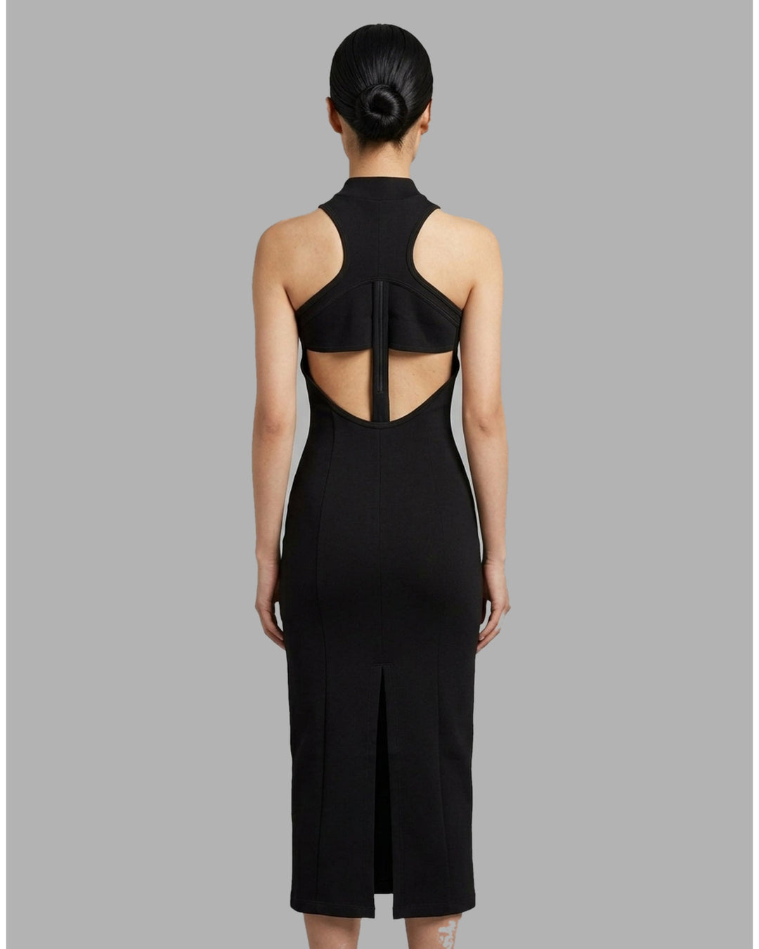 Back view of the Luna sleeveless high-neck midi dress in black stretch modal jersey with a concealed centre back zip - back