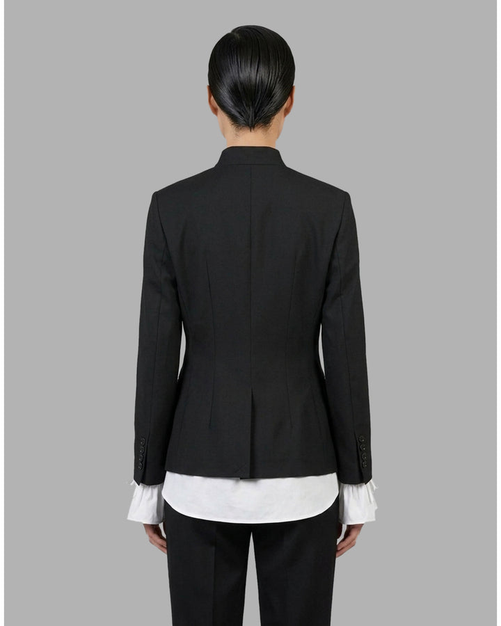 Black wool-mix tailored jacket with asymmetric button front, stand collar, welt chest pocket and flap hip pockets - back