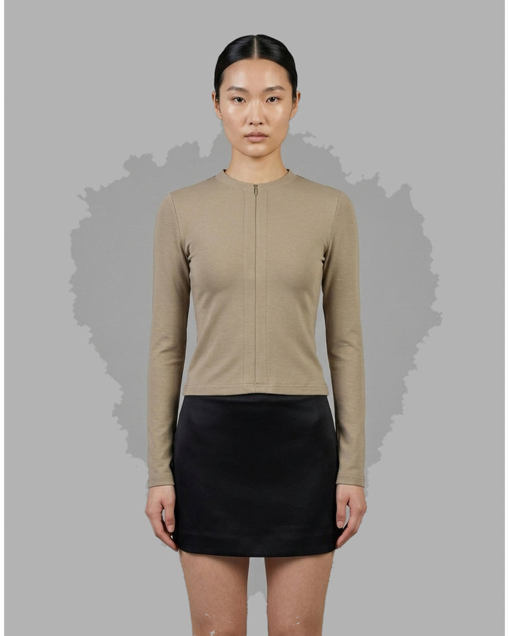Black long sleeve zip-front top in high stretch modal jersey with a crew neckline and vertical front seams - front