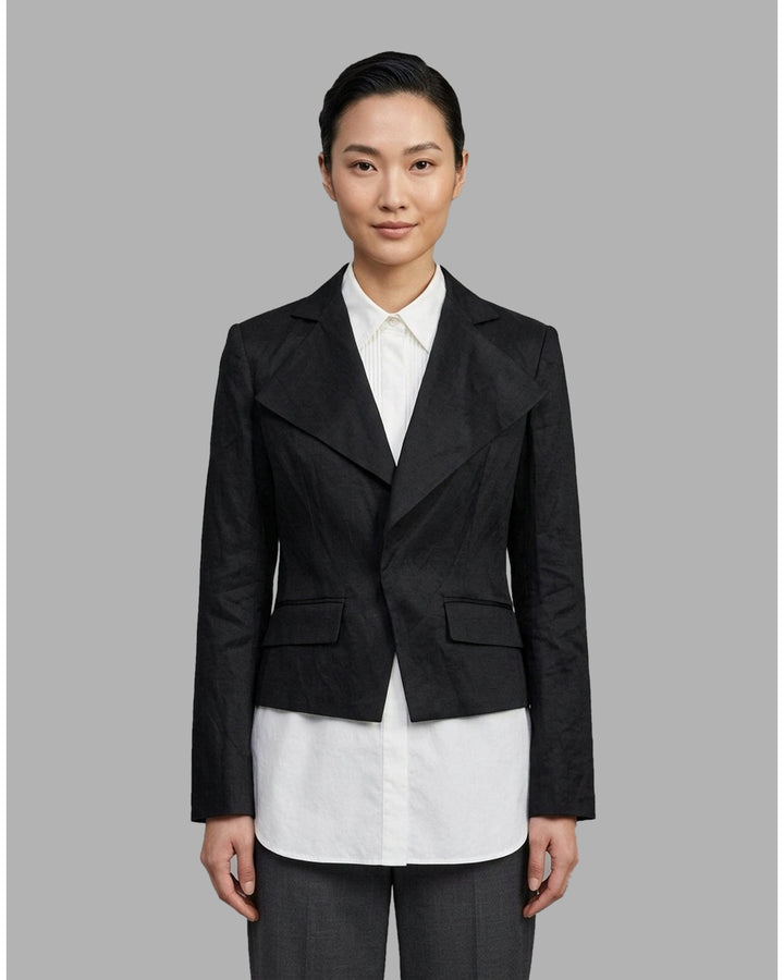 Black cropped blazer with wide notched lapels, flap pockets and a crinkled finish from Club21 Collection - front