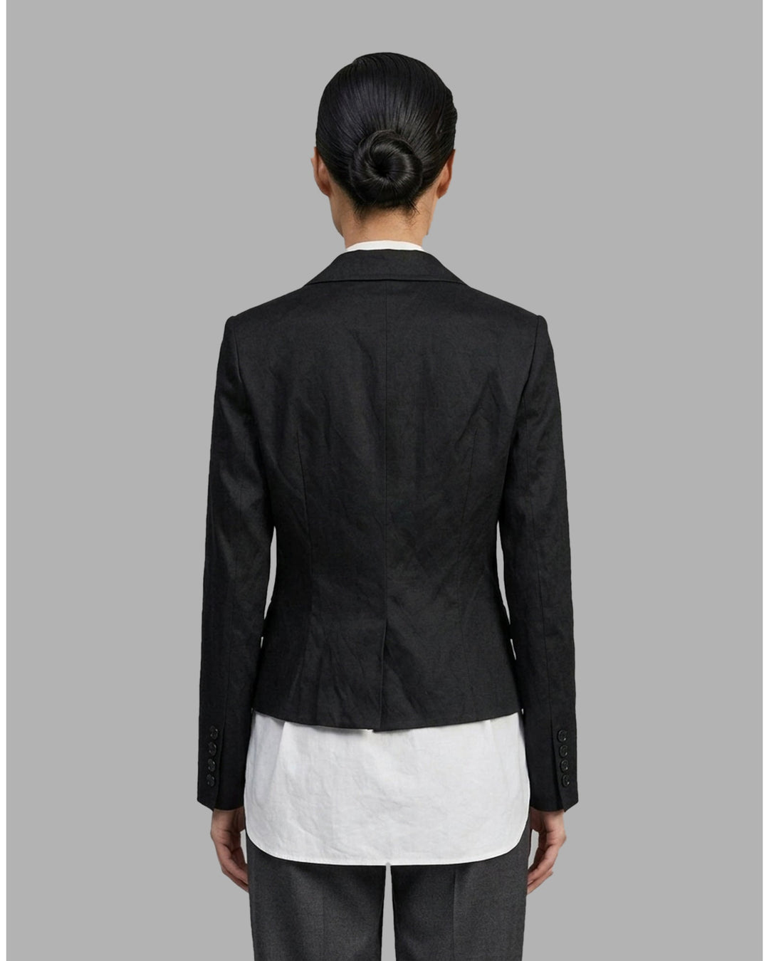 Black cropped blazer with wide notched lapels, flap pockets and a crinkled finish from Club21 Collection - back