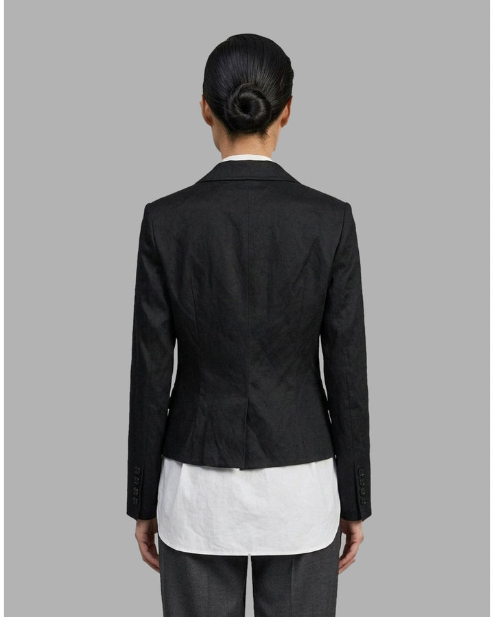 Black cropped blazer with wide notched lapels, flap pockets and a crinkled finish from Club21 Collection - back