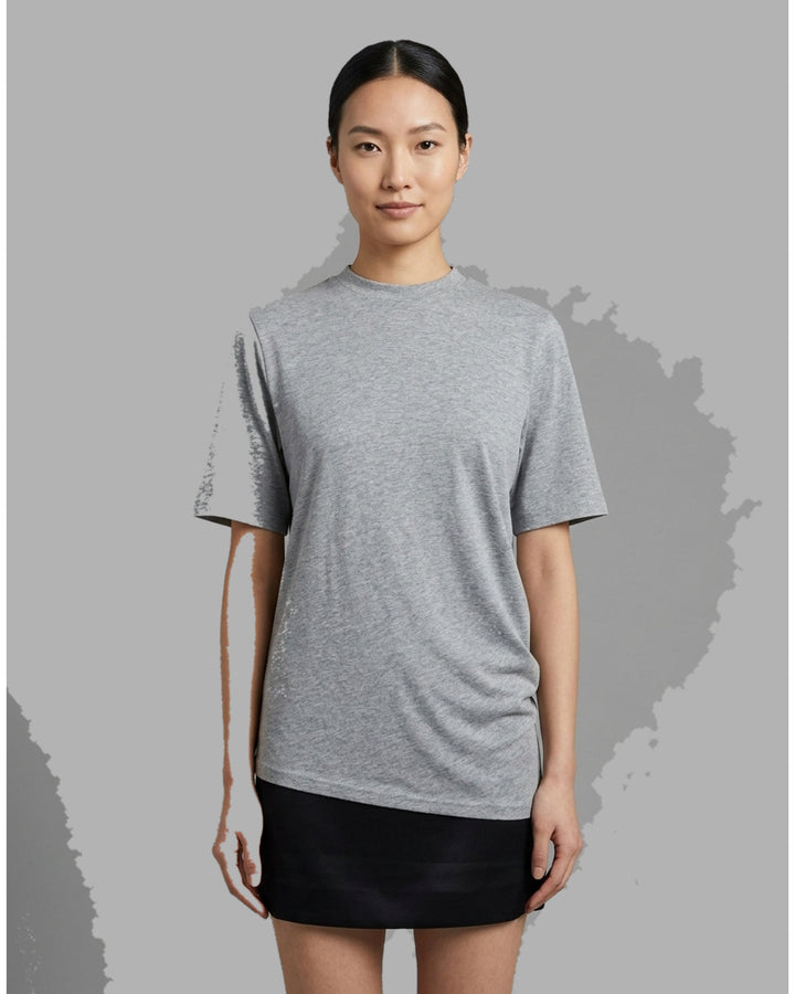 Black short-sleeve crew neck jersey tee with gathered side draping and an asymmetric hem, shown flat against a white background - front