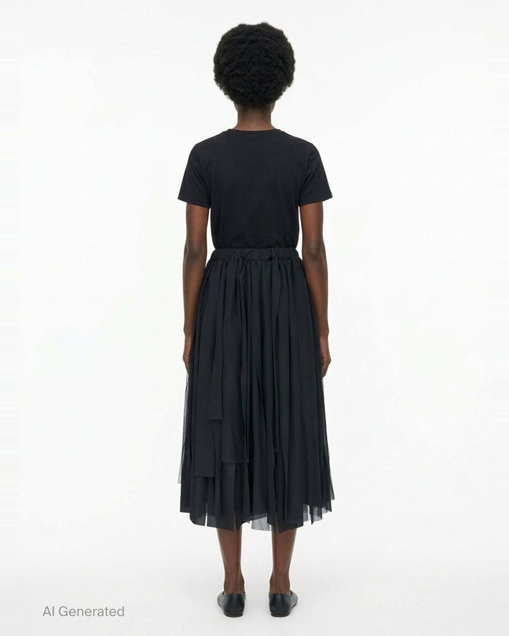 Comme des Garçons black asymmetric layered pleated midi skirt with elasticated waist and cascading ribbon-like sheer panels - back