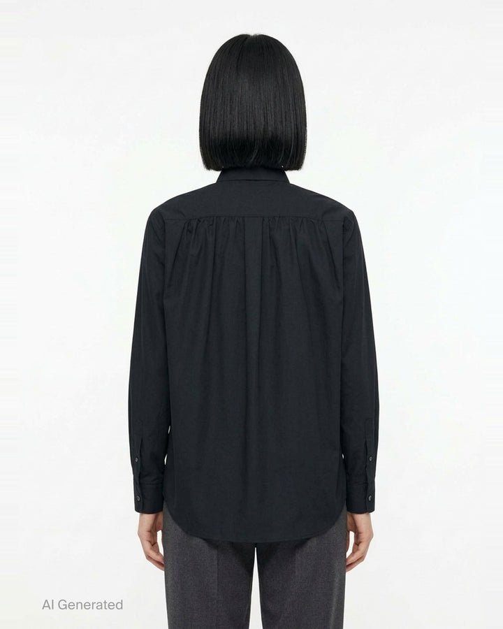 Comme des Garçons Black long sleeve polyester broad shirt in navy, featuring a point collar, tonal buttons, and a chest patch pocket - back