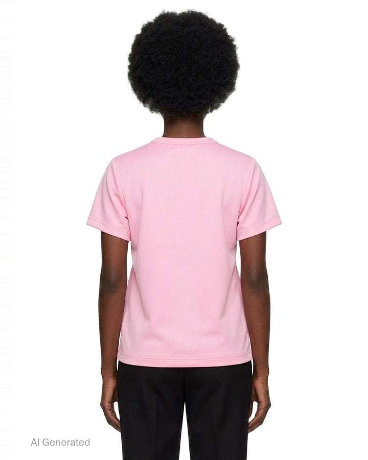 Comme des Garçons Girl pink short sleeve tee with multiple ribbon bows scattered across the chest, relaxed boxy fit with turned-back cuffs and ribbed hem - back