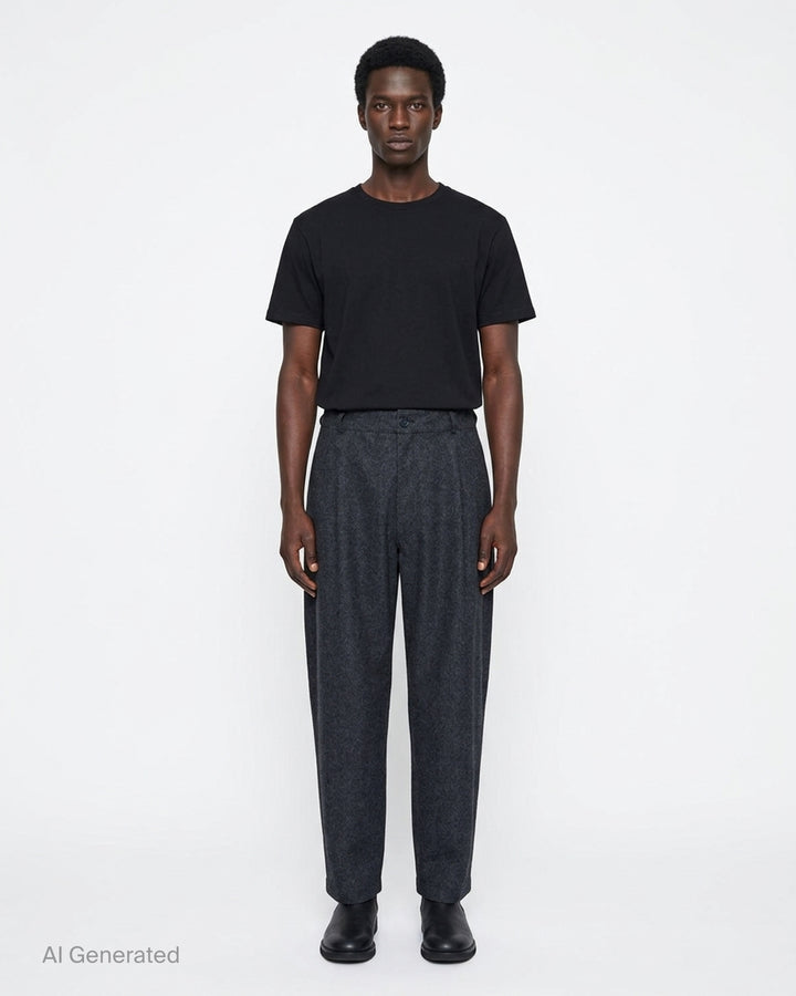 Charcoal heathered relaxed tapered pants with pleated front and button closure by Comme des Garçons Shirt - front